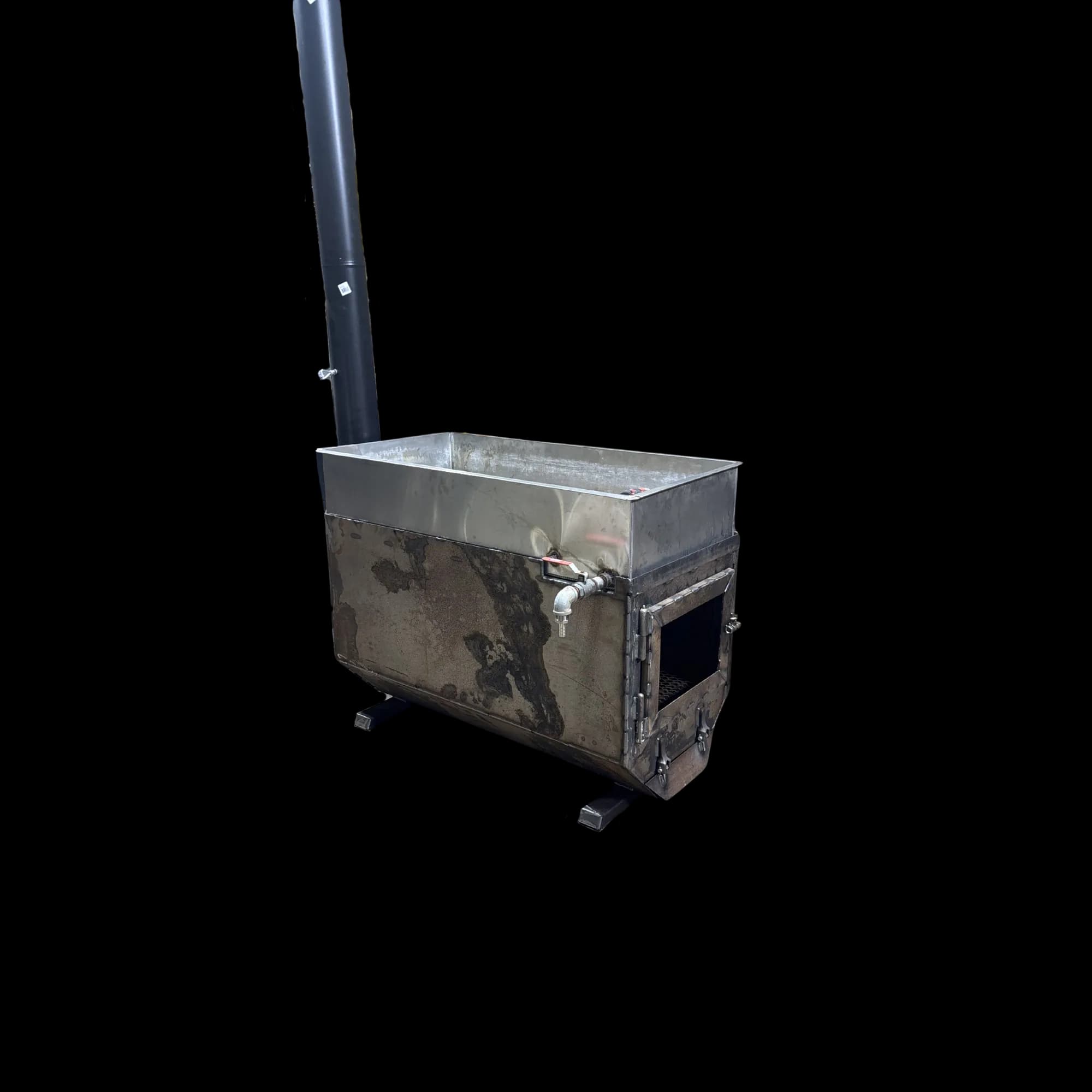 Sap Evaporator — Wood-fired sap evaporator with chimney stack